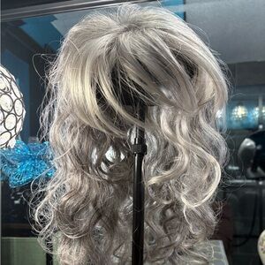 Godiva’s Secret Wigs Paris Topper in Silver Stone